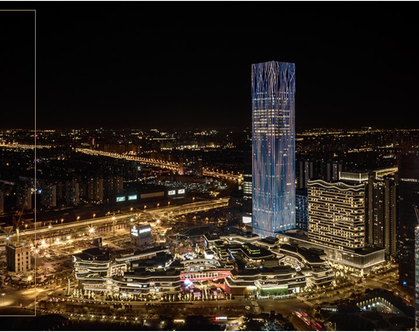 Qiantan Center night skyline and illuminated tower in Shanghai